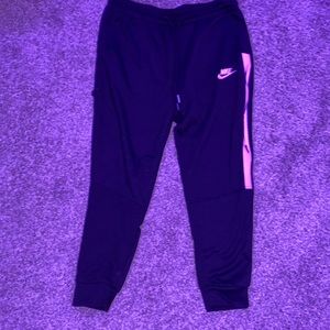 Black and pink Nike sweatpants